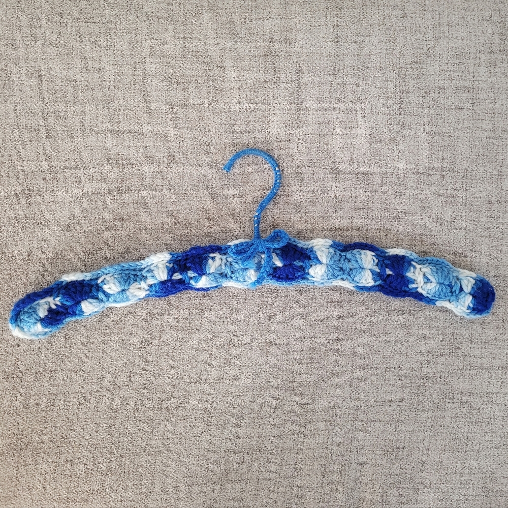 Vintage handmade knit clothing hanger